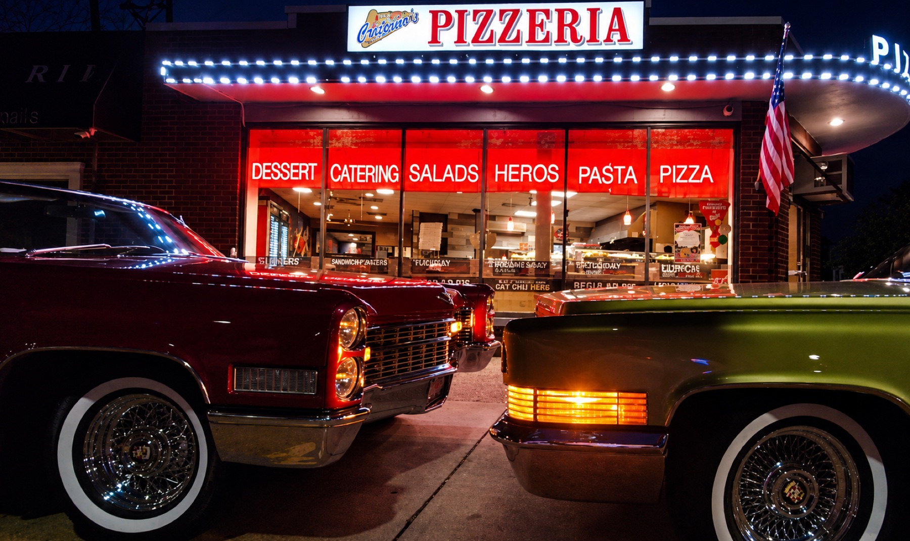 Crispino's Pizzeria storefront in West Islip at night